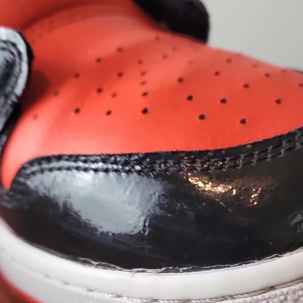 Air Jordan 1 Low Kids Black and Orange Sneakers